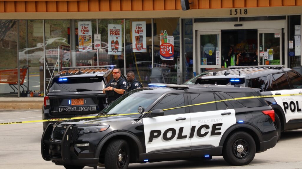 Police vehicles in front of the Rushco gas station 