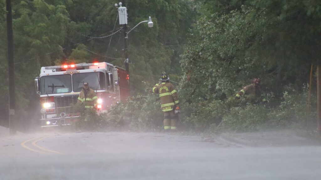 China Grove Firefighters cleaning up downed tree on Centerview St. 